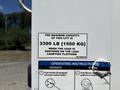 2020 Hino 338 truck with a lift capacity of 3300 lb displayed on a safety instruction label