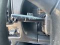 Control stalk for lights and wipers located on the steering column of a 2005 GMC C7500 Topkick