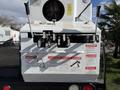 Close-up view of the control panel featuring levers and danger warning labels on a 2008 Kenworth T370 truck