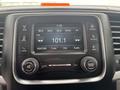 The dashboard display of a 2016 RAM 1500 shows radio interface with options for AM/SXM FM and various tuning features