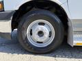 Close-up of a tire mounted on a 2020 Chevrolet Express showing detailed tread pattern and metal wheel rim