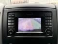 Dashboard display of a 2017 Mercedes-Benz Sprinter showing a rearview camera view with parking guidelines