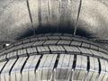Close-up of a tire from a 2020 Mercedes-Benz Sprinter 2500 showing detailed tread pattern and texture