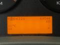 Dashboard display of a 2012 International 7400 showing mileage of 69544 KM and a temperature of 11 degrees Celsius