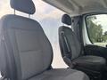 Two fabric seats in a 2023 RAM Promaster 3500 van interior with adjustable headrests and armrests