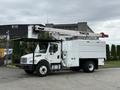 A white 2021 Freightliner M2 106 utility truck equipped with a large extendable articulating boom on the roof and storage compartments on the side