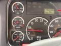 Dashboard of a 2014 Freightliner B2 showing gauges for oil pressure water temperature transmission temperature and RPM