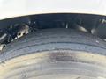 Close-up of the tire from a 2016 Ford F-750 showing the tread pattern and sidewall details