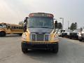 A yellow 2007 Freightliner B2 school bus facing forward with visible windshield wipers and side mirrors