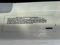 Vehicle noise emission control information placard for a 2022 Freightliner M2 106 detailing manufacturer information and compliance regulations