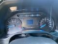 Dashboard of a 2017 Ford F-250 SD showing speedometer and fuel gauge with a digital display in the center