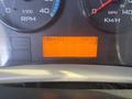 Dashboard display of a 2008 International 4400 showing RPM speedometer fuel gauge and an odometer reading of 159741 KM