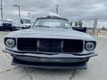 Front view of a 1968 Ford Mustang Two Door Convertible with a sleek design and black grille