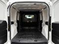 A 2017 RAM ProMaster City with an open rear cargo area featuring a flat floor and black rubber matting along the sides and rear wall