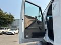 A 2006 Sterling Acterra truck with an open driver's side door showing the interior door panel and handle