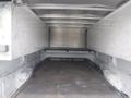 Interior view of a 2015 Chevrolet Silverado 1500 truck bed showing a spacious and clean cargo area with a flat floor and metal lining