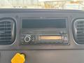 Dashboard of a 2016 Freightliner M2 106 showing a radio unit with controls and an empty slot above it