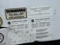 A 2016 Continental cargo trailer featuring labels with information on cargo capacity and tire loading instructions