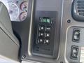 Control panel of a 2019 Freightliner M2 106 featuring buttons for transmission settings including drive neutral and mode options