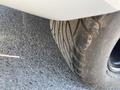 Close-up of a tire from a 1962 Ford 2WHDR showing tread patterns and details of the rubber surface