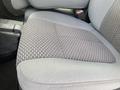 The image shows the gray fabric seat upholstery of a 2015 Ford F-250 SD with a textured pattern and a smooth area for comfort