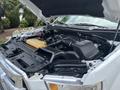 A 2017 Ford F-150 engine bay showing the engine components including the air intake and coolant reservoir