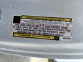 Label on a 2016 RAM 5500 indicating seating capacity tire and loading information and instructions for final stage manufacturers