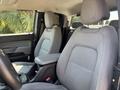 Interior of a 2017 Chevrolet Colorado featuring gray fabric seats with a central armrest and a spacious cabin layout