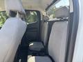 Interior of a 2017 Chevrolet Colorado showing two gray fabric rear seats with headrests and door panel visible behind seats