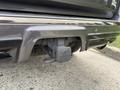A gray 2021 Toyota 4Runner with a visible tow hitch and rear bumper details