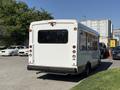 A white 2020 Chevrolet Express van parked with a simple design and visible taillights