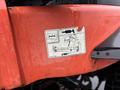 A close-up of a label on a Kubota F3680 lawn tractor showing instructions and diagrams related to its operation