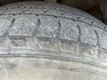 Close-up view of a worn tire from a 2018 Toyota Highlander showing tread wear and texture
