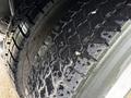 Close-up of a wet tire on a 2011 International 7500 showcasing the tread pattern and texture