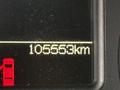 A digital odometer display showing a reading of 105563 kilometers