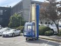 A 2023 Bitimec SC415 is parked with a blue and transparent enclosure and a tall blue cleaning brush attachment on the side