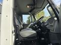 Interior view of a 2012 International DuraStar 4300 showing the driver's seat steering wheel and dashboard