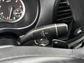 The gear shift lever of a 2021 Mercedes-Benz Metris featuring the positions P R N D