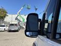 A 2020 RAM ProMaster 3500 van showcasing its side mirror reflecting another vehicle parked nearby