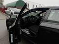 A 2017 Dodge Charger with the driver's side door open, showcasing the interior including the steering wheel and seats