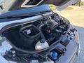 The engine compartment of a 2021 Mercedes-Benz Sprinter 2500 showing the air intake and various components including a fluid reservoir and a black plastic box