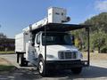 A 2019 Freightliner M2 106 utility truck with an elevated work platform mounted on top and a box truck body designed for maintenance and service tasks