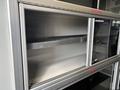 A 2020 Mercedes-Benz Sprinter 2500 with a spacious cargo area and tall interior designed for commercial use featuring shelving and storage compartments