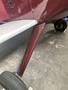 1986 Sorrell Hiperbipe SNS-7 Amateur-Built Aircraft showcasing the landing gear and wing strut with a glossy maroon finish and a gray wing surface