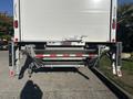 A 2022 Lion Lion6 truck with an extended liftgate at the rear