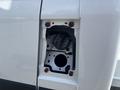 Fuel filler neck of a 2023 RAM Promaster 3500 with a cap visible inside the opening