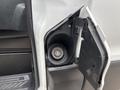 A close-up view of the fuel filler cap on a 2020 Ford Transit 250 with the cap partially open