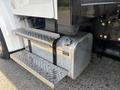 2022 Freightliner M2 106 with metallic steps and a fuel tank on the side