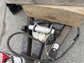 Close-up of a 2016 Continental cargo trailer hitch assembly with wiring and a metal coupler connected to the trailer frame