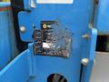 Label on a 2016 Genie TZ-34/20 showing inspection dates with visible wear and scratches